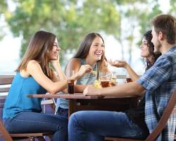 Image of group of friends laughing and talking