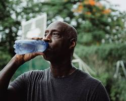 Image of person drinking water