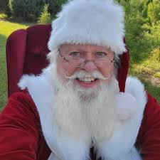 What led to the arrest of a for-hire Santa and 18 others in a child predator sting?