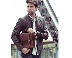 Image of man wearing a stylish leather messenger bag