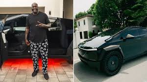 In Photos: Shaquille O'Neal secures stylish custom all-black carbon fiber 
Tesla Cybertruck