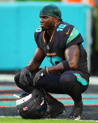 Tyreek Hill during an NFL game and comeback speculation