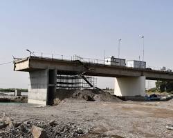 reconstruction works AlRasheed Bridge Euphrates River Raqqa Syria 2026، من إنشاء الذكاء الاصطناعي