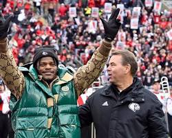 Image of Lamar Jackson celebrating touchdown at University of Louisville