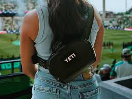 Yeti just released an extremely practical crossbody bag with magnetic closure that opens with one hand