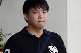 Tan Jian Liang (above) chased cabby Seah Teck Kim and punched him after Mr Seah tried to wake him up to get more details of his destination. Elena Chong - 20140408_beatuptaxidriver_st