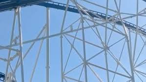 Riders walk down huge coaster at Six Flags Over Texas. See the video.