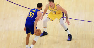 Luka Doncic and Stephen Curry prepare for the Warriors vs Lakers season opener