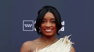 Simone Biles says she's 'staying inside' after $22K red carpet bill