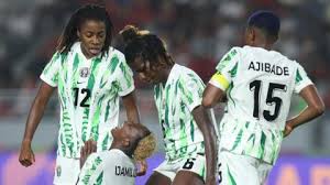 Nigerian women football team celebrating their WAFCON victory