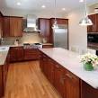 Cherry cabinets with white countertops california