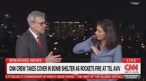 🚨🇮🇱 🇮🇷 CNN journalists duck for cover live on air in a bomb shelter while rockets hit Tel Aviv.