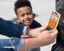 Image of someone using the ChargePoint app on their smartphone to find and pay for charging stations