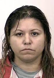 Maria Elena Torres faces a charge of murder and assault on a child. UNKNOWN — Unknown - jr27a.AuSt.11