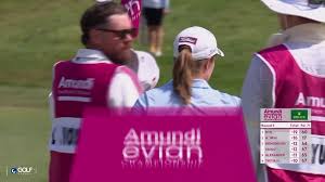 Haeran Ryu counts up the birdies on her card at Amundi Evian Championship