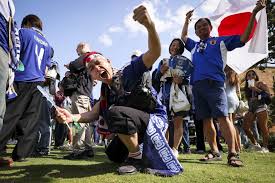 Japanese fans turn downtown Dallas park blue ahead of FIFA World Cup match against Sweden