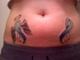 Angel Wings Breast Cancer Ribbon Tattoo On Belly - breast-cancer-ribbon-angel-wings-tattoo-on-belly