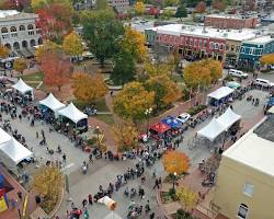 Bentonville Arkansas downtown square First Friday festival food trucks, AI generated