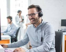 smiling customer service representative helping a customer