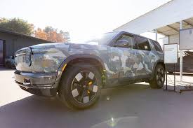 Rivian Boosts Delivery Outlook as EV Sales Top Estimates