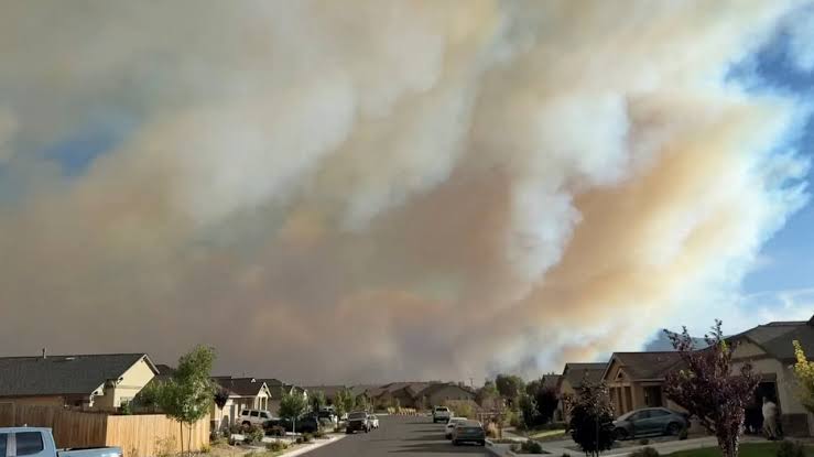 Hawk Fire grows in Nevada, forcing 90,000 to evacuate as homes burn; officials say fire is human-caused