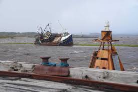 Coastal communities told to remain vigilant for floods as wind warnings lifted