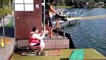 Fat guy water skiing