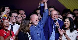 WhatsApp chat on smartphone at Brazil election rally 2026