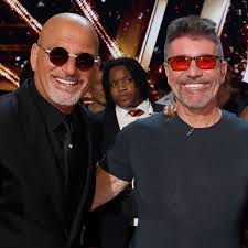 Simon Cowell has been missing from AGT due to back surgery; Howie Mandel confirmed Cowell's surgery went w - The Economic Times
