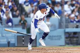 Dodgers rally to top Brewers after getting bruised early