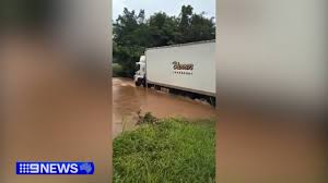 Queensland on alert as tropical low lingers at sea