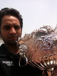 International Disabled Cricketer: Vijaykant Tiwary. Vijaykant Tiwari with the MOL Indo-Pak Cricket Series Trophy. Meet our guest for SportsMeet-Bangalore ... - with-cup
