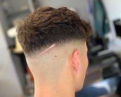 Imagem de Skin Fade em cabelo ondulado