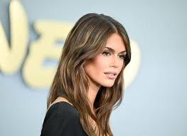 Kaia Gerber Nods to Mom Cindy Crawford’s ‘90s Supermodel Style in Slinky Satin LBD