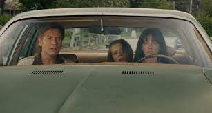 The End Of Oak Street Trailer: Anne Hathaway & Ewan McGregor Run From Dinosaurs