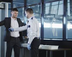 Image of metal detector security checkpoint at an airport