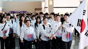 Diverse Flag Bearers Lead Teams: S. Korea Chooses Shin Yu-bin, Japan Picks Female Wrestling Star Fujinami