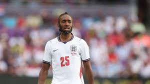 Why does England's Djed Spence wear a face mask at the World Cup?