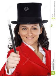 Attractive business woman with a magic wand and hat a over white background. MR: YES; PR: NO - attractive-business-woman-magic-wand-hat-2063765