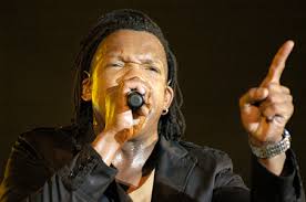 Chronicle/Kristin EbertsLead singer Michael Tait, of Newsboys, performs during the final day of the Unity Christian Music Festival on Saturday at Heritage ... - large_00unity9