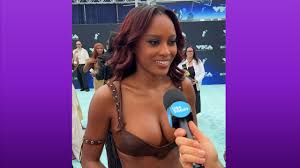 Ciara Miller discussing Shaboozey’s Cowgirl music video on the 2026 VMAs red carpet