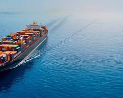 صورة giant container ships and bulk carriers at sea
