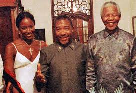 Mandela's Most Inspiring Pictures of his Life with Family, Close Friends & Aquaintances Images?q=tbn:ANd9GcQr8Z18sOQ9A4zULmSL5QVOuZydfkAVYkpapsl8FVJBjJ1KCqQF