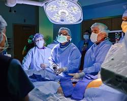 surgeon performing transcatheter valve replacement