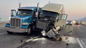 Crash involving two semi-trucks, car causes heavy delays on I-15 in Ogden