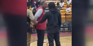 Coach Taylor on the sidelines