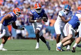 Gators roll past Ole Miss and Trinidad Chambliss to remain unbeaten — Orlando Sentinel