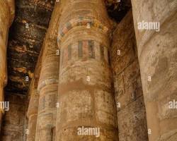 Image of hypostyle hall of the Temple of Khonsu, with its decorated columns and ceiling.