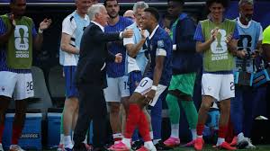Kylian Mbappé celebrates historic goal