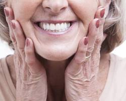 Image of someone smiling with dentures